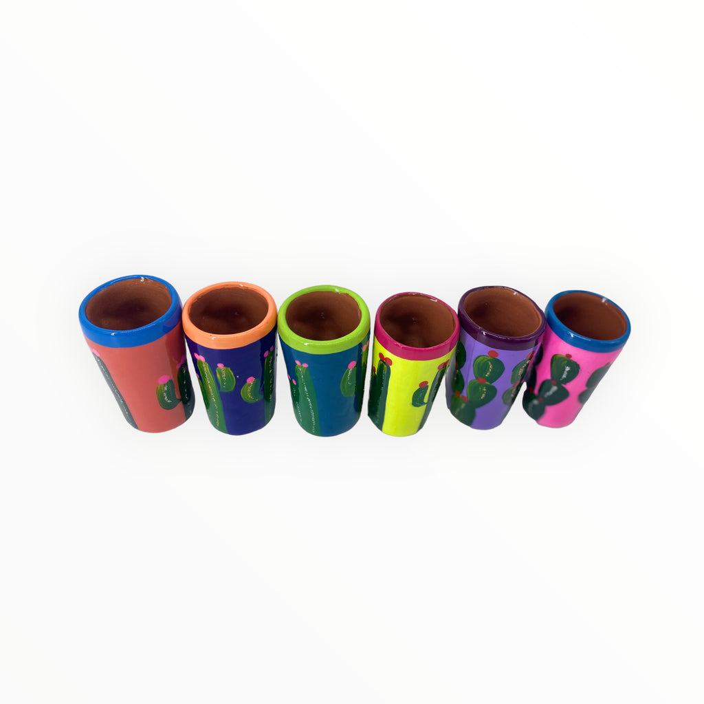 Crafted with care and hand-painted, these  shot glasses are a delightful addition to your home bar.