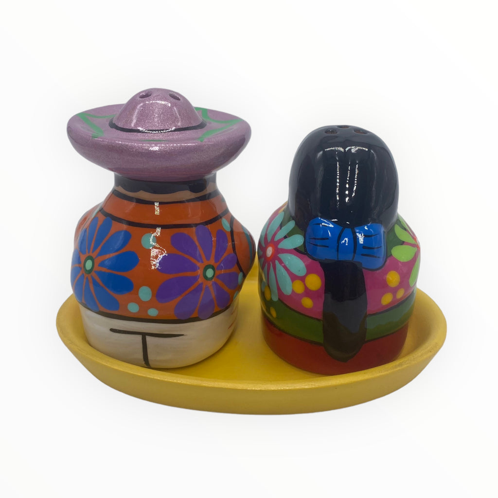 Bring a touch of Mexico's artistry to your dining table with this exquisite couple."