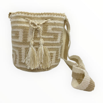 Handmade crochet mini bag in nude with boho tribal design, perfect for adding style to any outfit. Handcrafted with care using traditional techniques