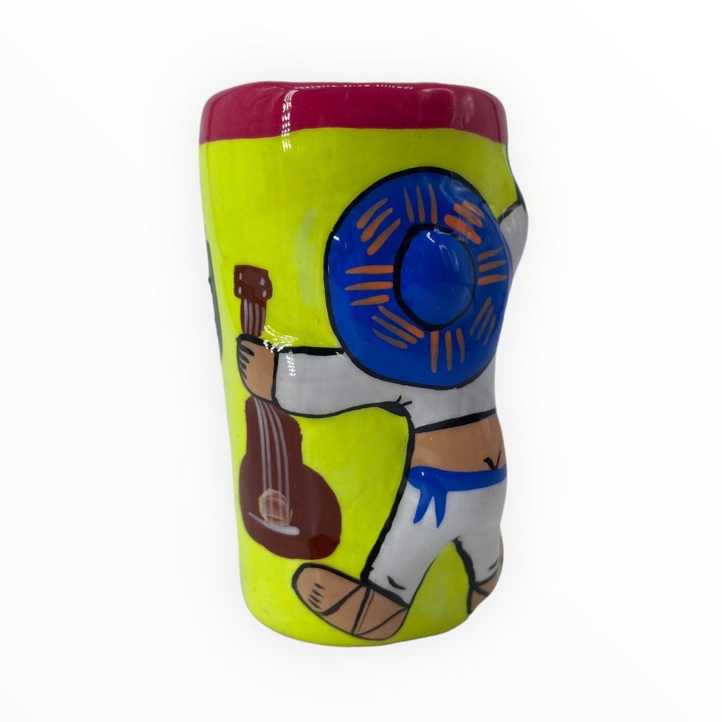 Acid Yellow Mariachi and Cactus Hand-Painted Shot Glass.Turn up the fun at your next fiesta with our Acid Yellow Mariachi and Cactus Hand-Painted Shot Glass. Handcrafted with care, it's perfect for sharing laughs and tequila shots