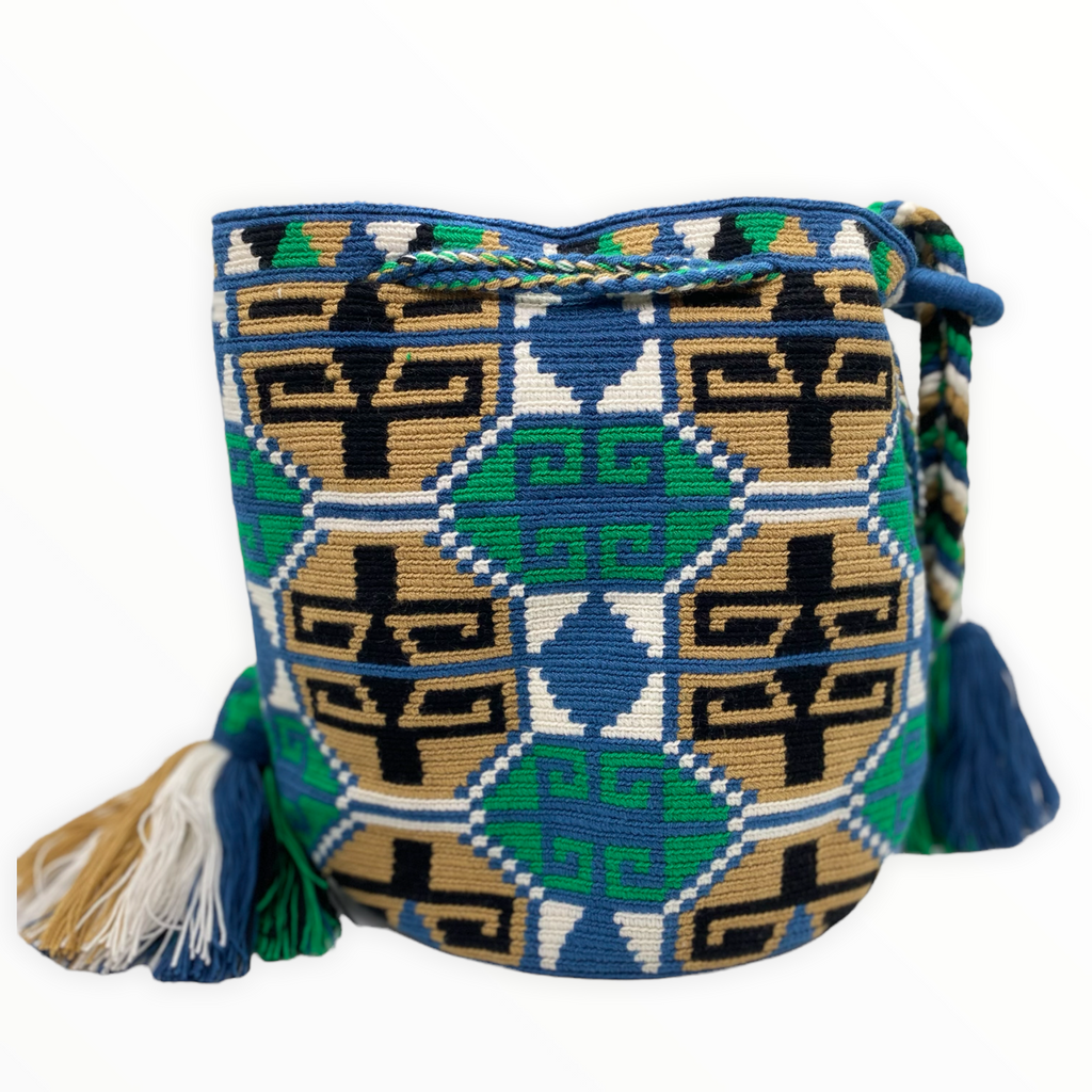 Stunning shoulder crochet bag crafted by native indigenous artisans of the Wayuu Tribe in Colombia; this bag revives the culture, beliefs, and life of Wayuu people with complex patterns.