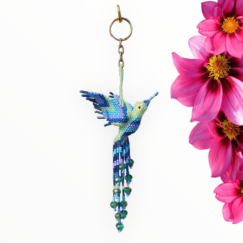 Blue tones hummingbird keychain, radiating positivity.