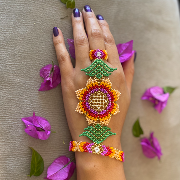 Beaded Bracelet Ring made with different colored beads strung one by one.   Handmade by craftswomen. 