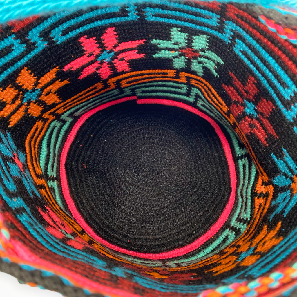 "This carefully handcrafted  cotton crochet bag was created by  Wayuu indigenous women from La Guajira Colombia"