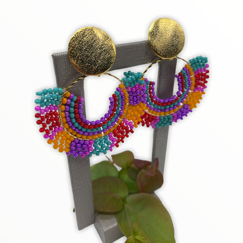 Neryco Jewelry and accessories are Handcrafted  by skilled artisans who have been practicing their techniques of weaving and embroidery  for generations.  Drop Earrings with an explosion of colors, textures, and designs  inspired by the retro rainbow.